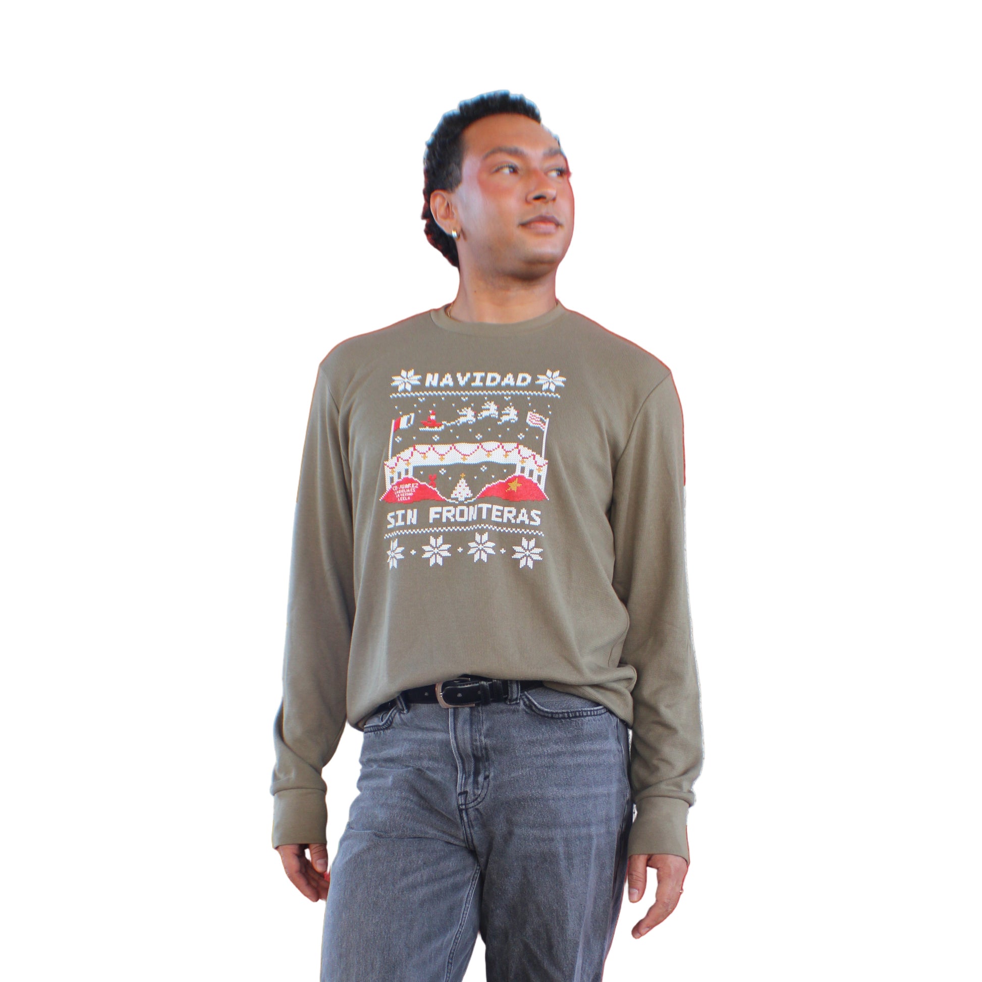 Person wearing a green shirt with a graphic design on a red and white platform.